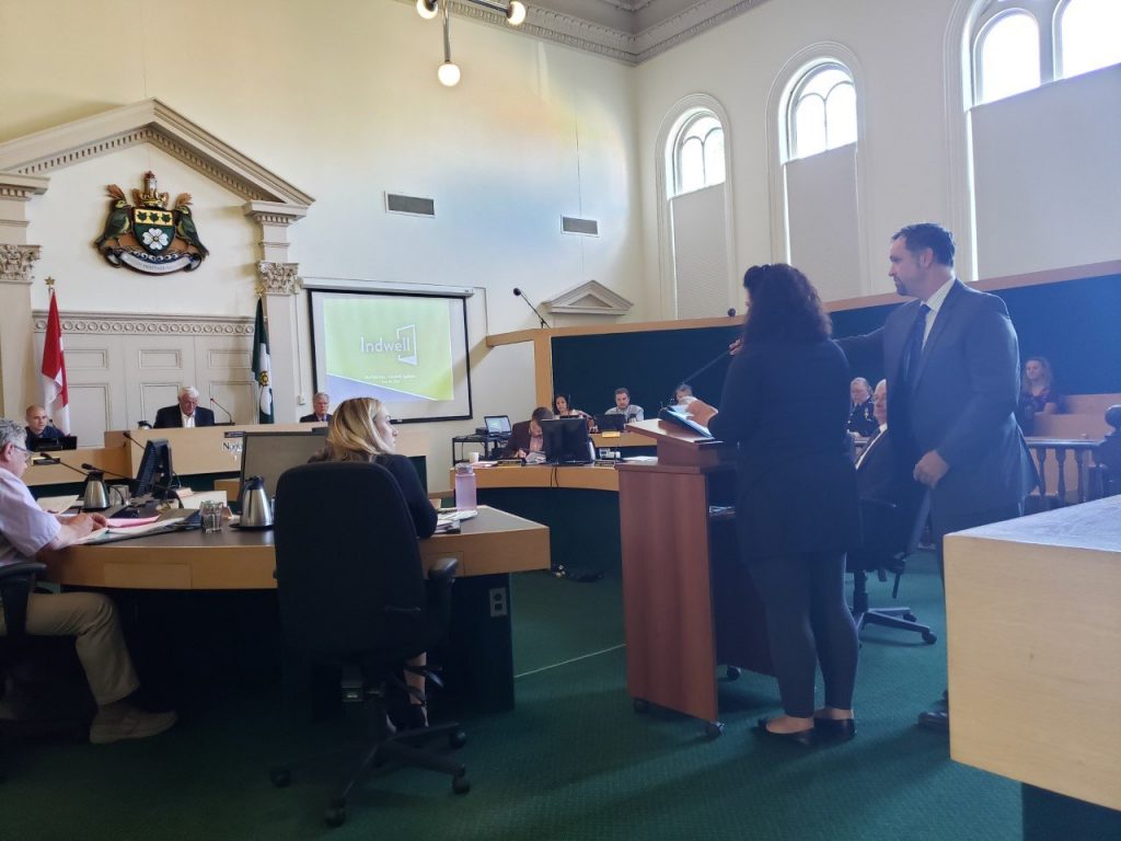 Leah Logan and Graham Cubitt at a Norfolk County Council Meeting