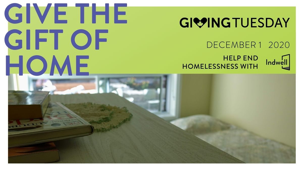 Give the Gift of Home - Giving Tuesday - 2020 - with table and books in the foreground, bed in background