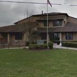 Russell Heights, Brant County - building with flag in front
