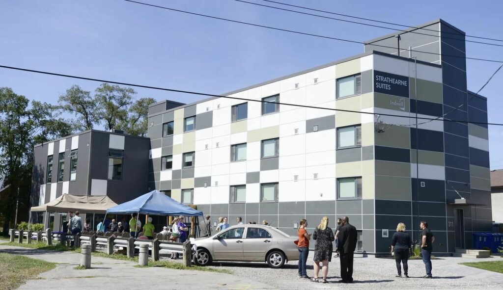 Strathearne Suites Grand Opening - 2016 - people gathering in front of the building